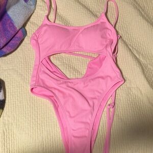 1 piece swimsuit , Color:pink , and fits 32-34 A Cups.